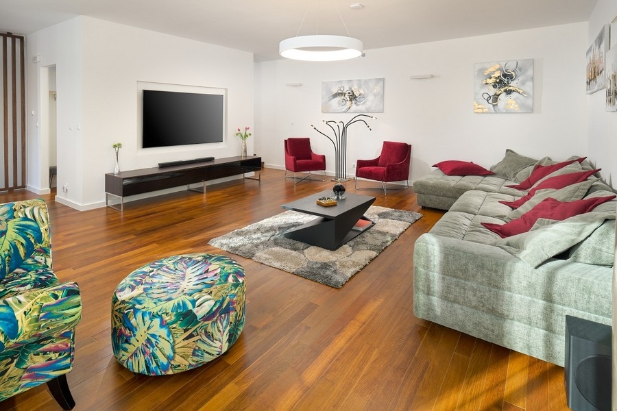 Living room with sofa corner and wooden floor