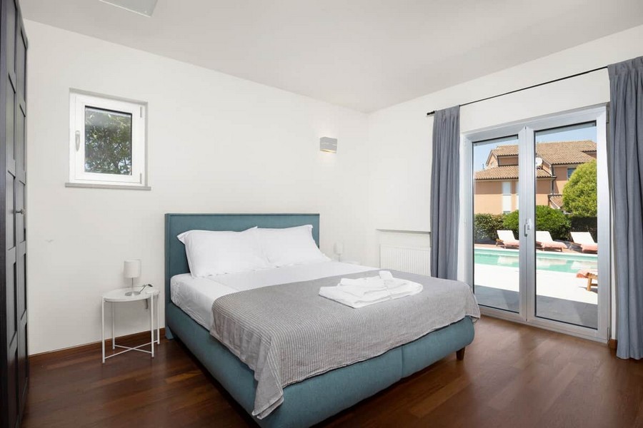 Bedroom overlooking the pool