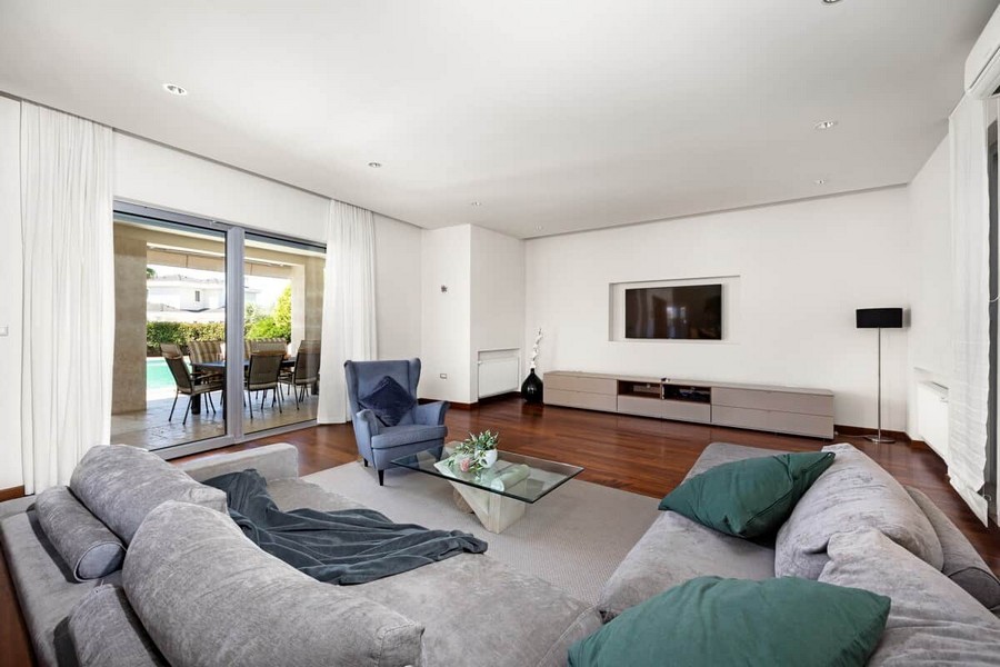 Living room with sofa and access to the terrace