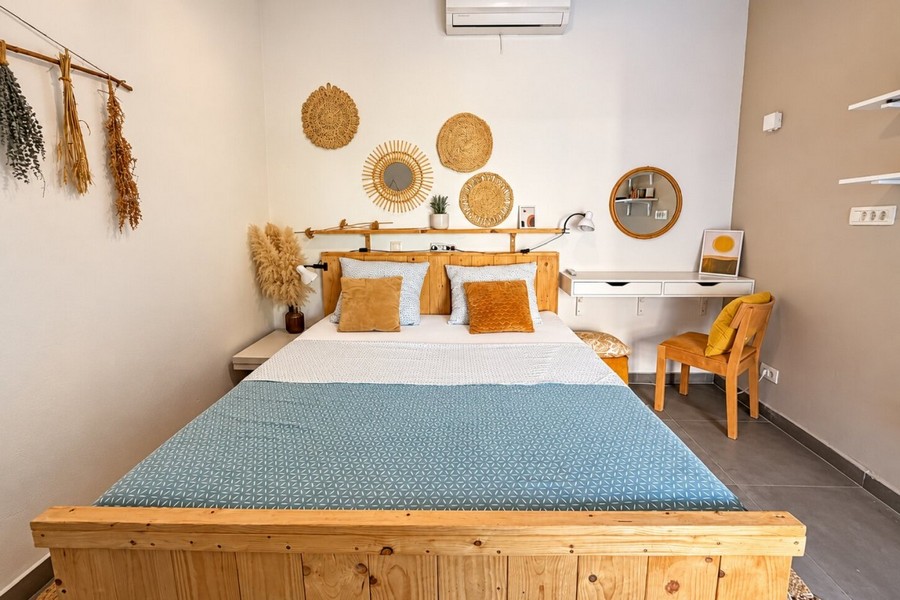 Bedroom with wooden double bed