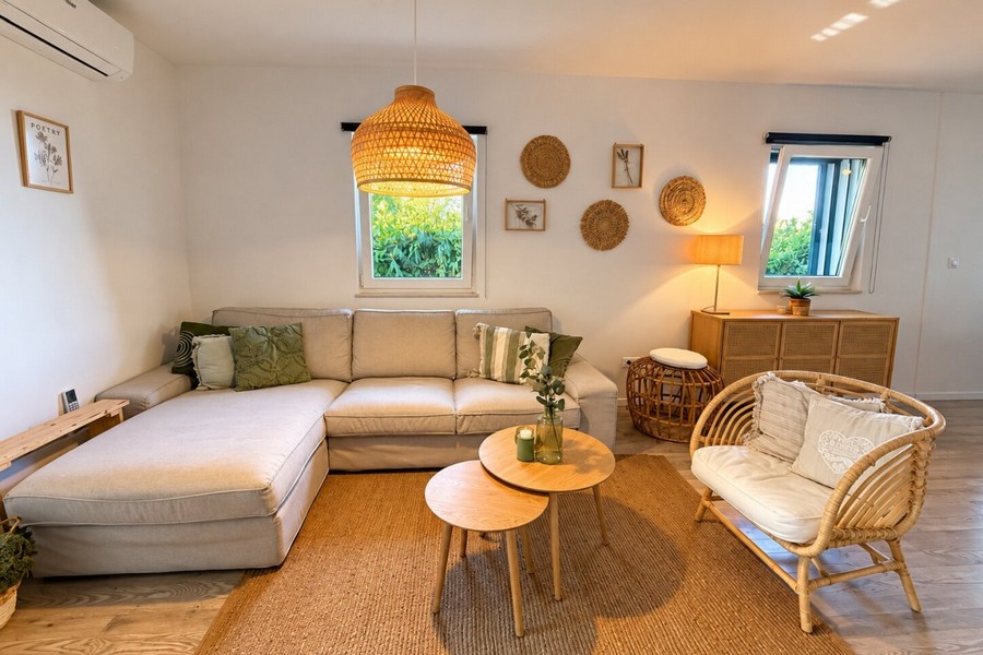 Living room with sofa and rattan furniture