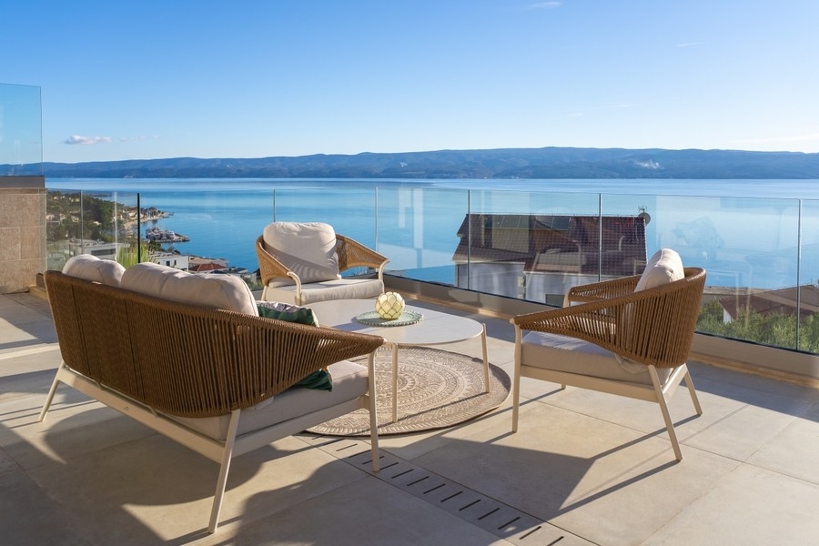 Terrace with lounge furniture and sea views