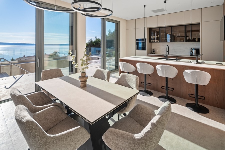 Dining table and kitchen overlooking the sea