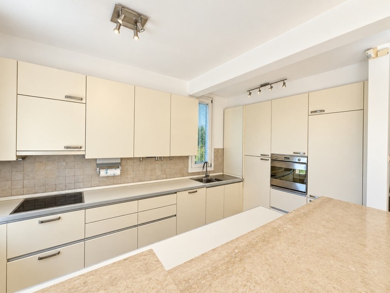 Kitchen with bright built-in cupboards