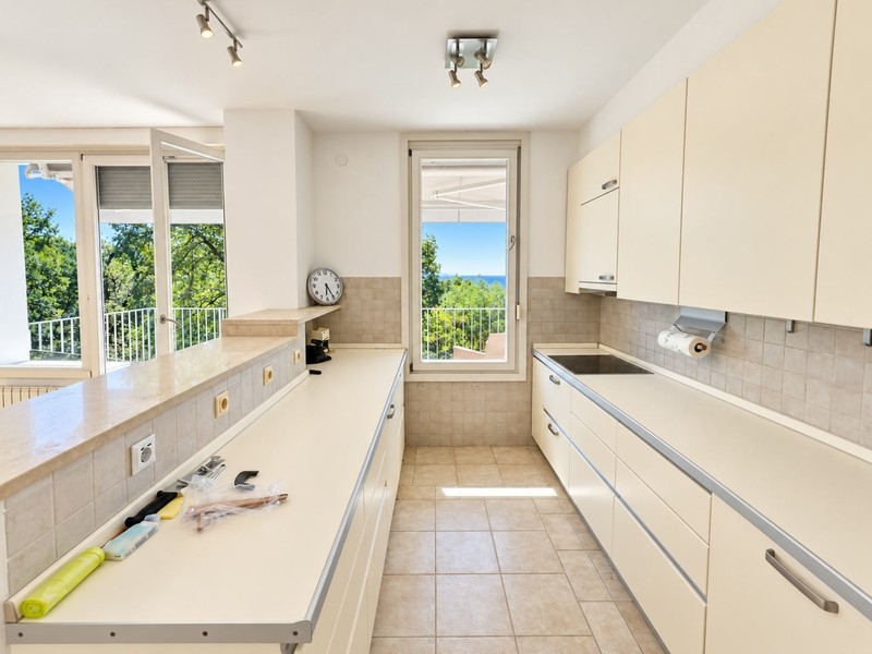 Kitchen with window and view of the greenery