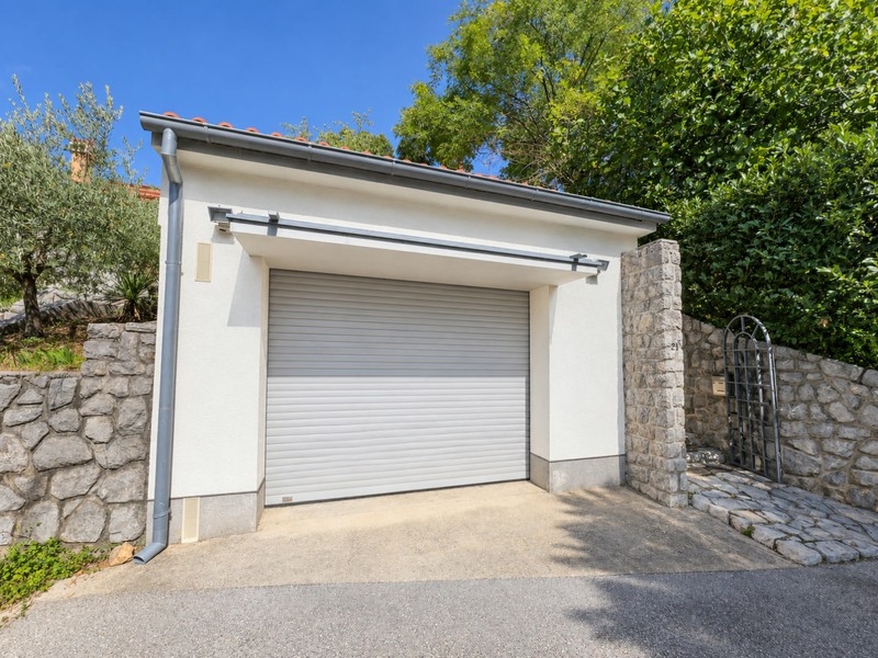 Garage with roller shutter