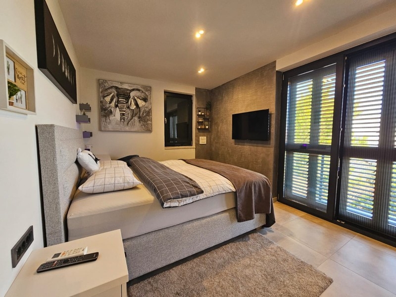 Bedroom with shutters