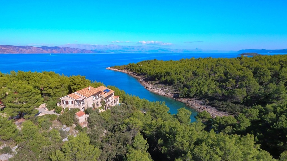 Stone house with pool in a bay on the island of Hvar