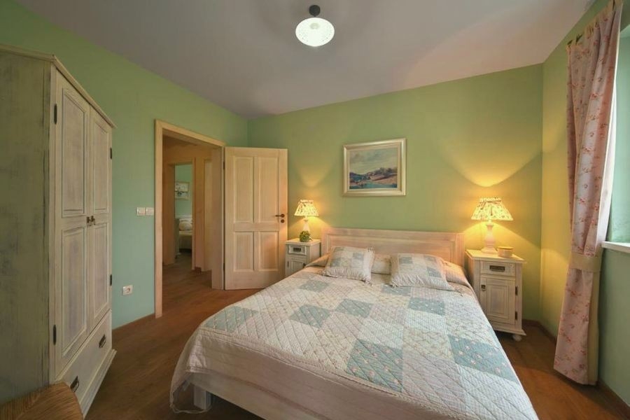 Bright bedroom with built-in wardrobe