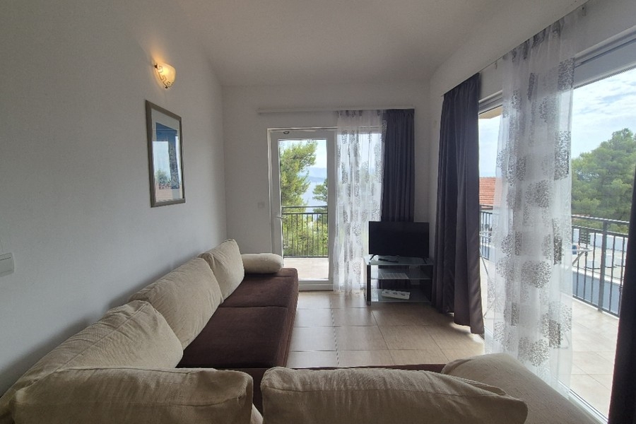 Living room with sofa and patio door