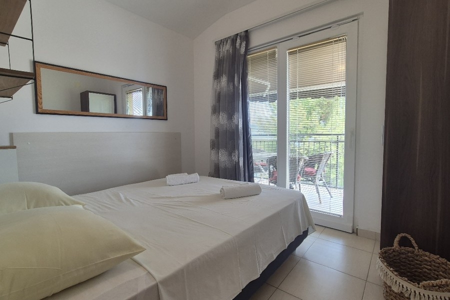 Bedroom with balcony door