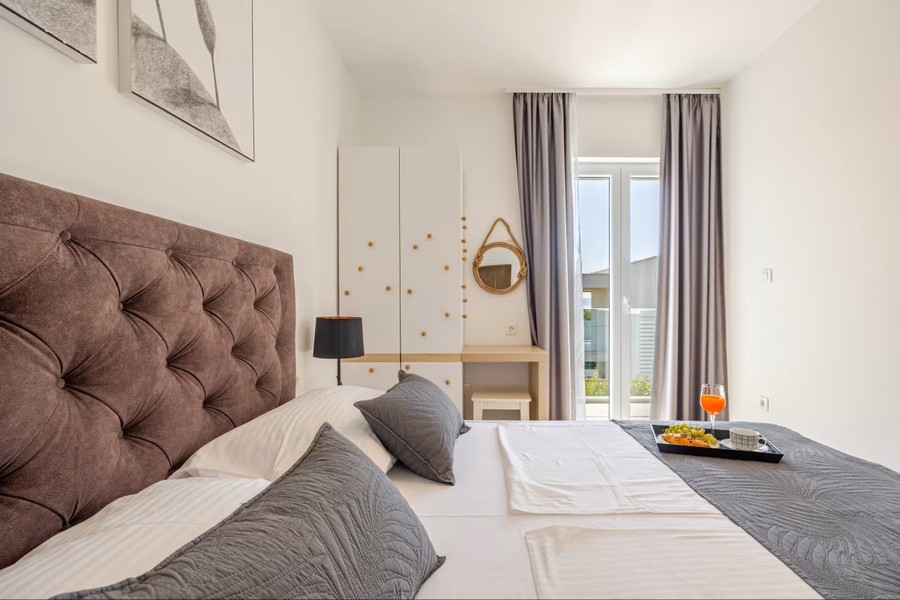 Bedroom with upholstered headboard