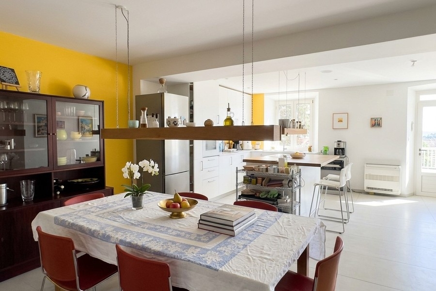 Kitchen with dining table and open living area