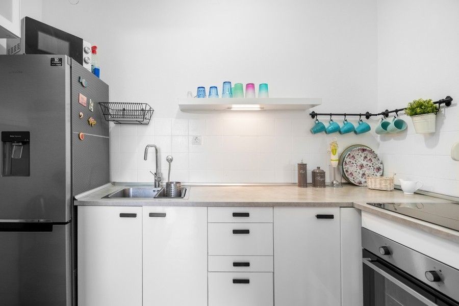 Kitchen with refrigerator and oven