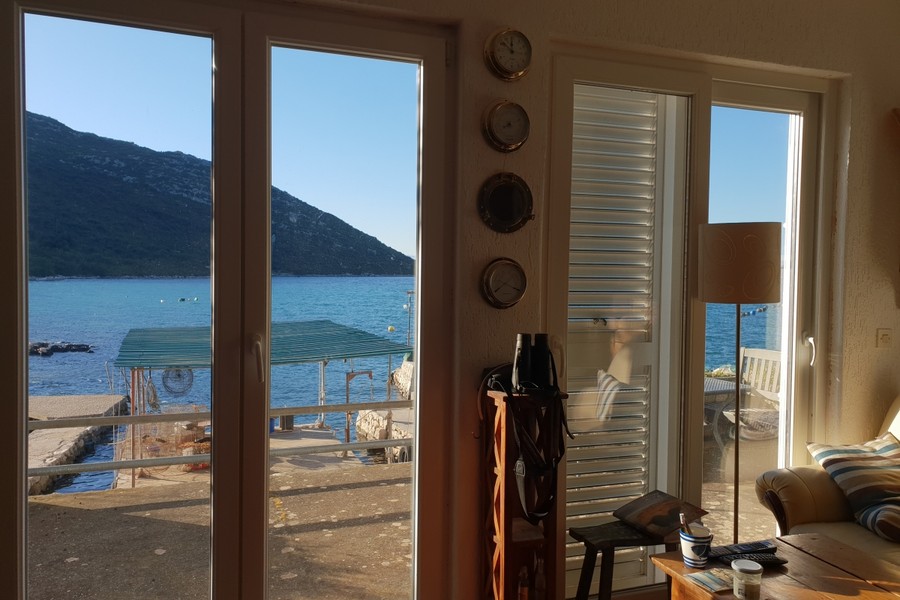 View of the sea through the patio door