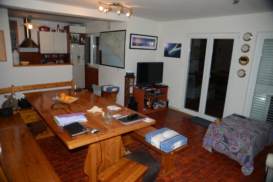 Living area with kitchen and dining area