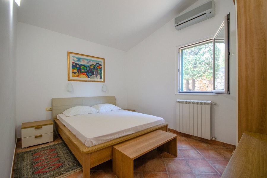 Bright bedroom with double bed