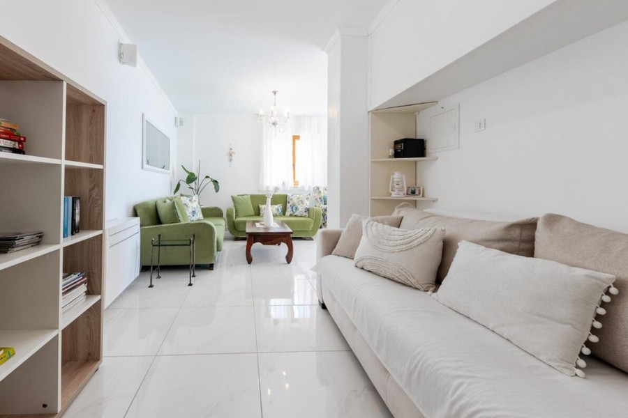 Living room with sofa and shelves