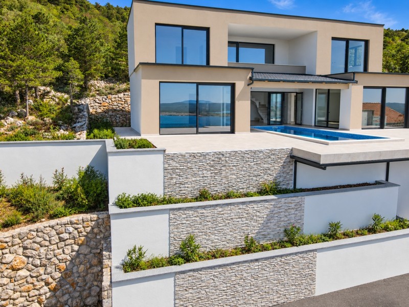Terraces of the villa with natural stone walls