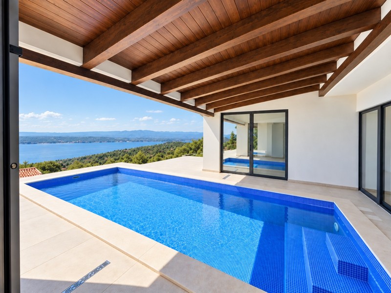 Partially covered pool overlooking the sea