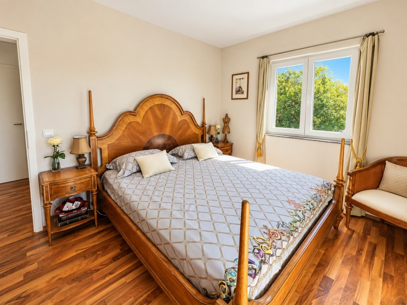 Bedroom with wooden bed