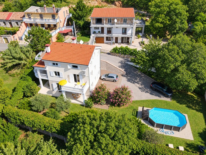 House with pool and garden from the air
