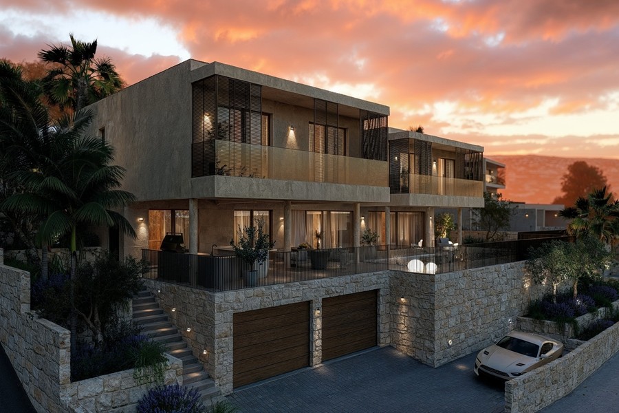 Villa with garage and illuminated facade in the evening