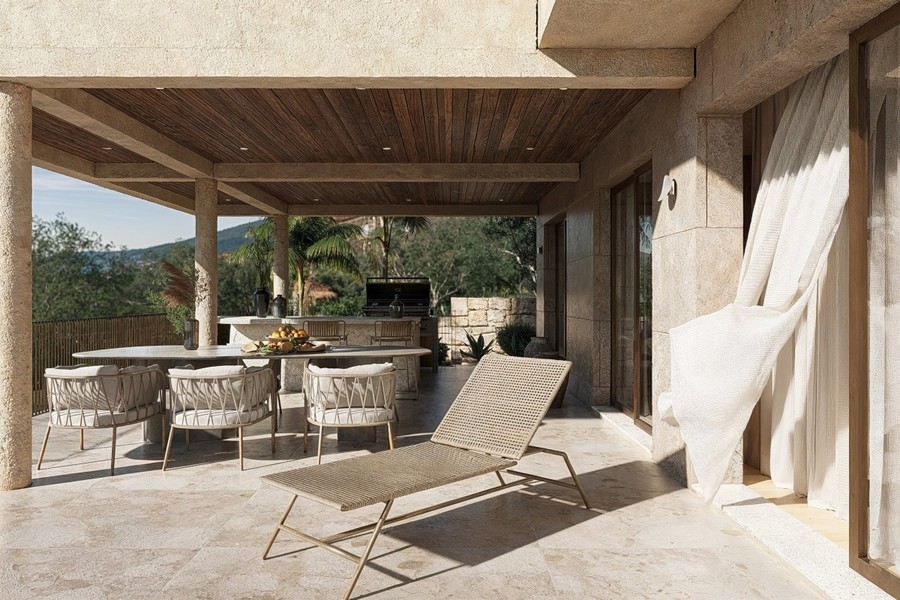 Terrace with sun lounger and dining table