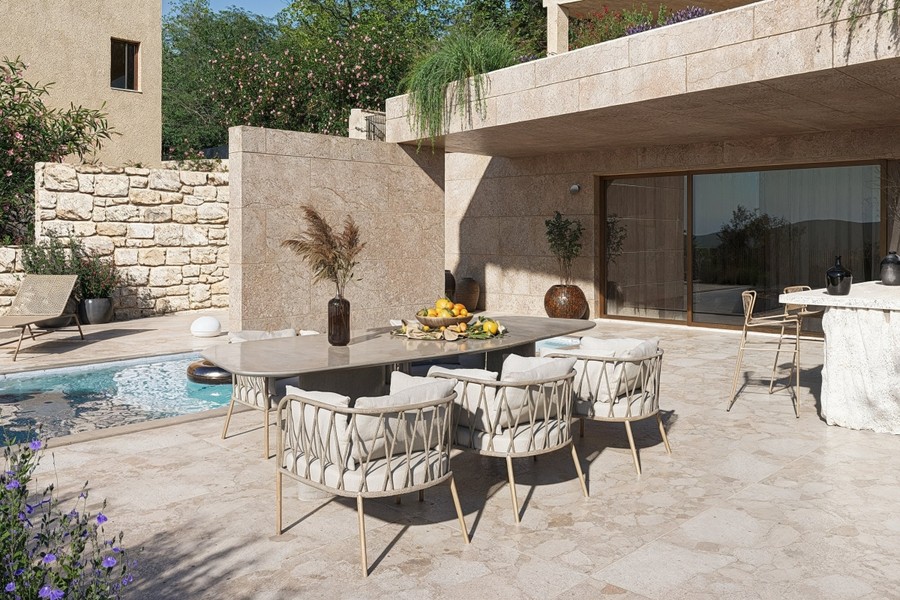 Outdoor dining table next to the pool