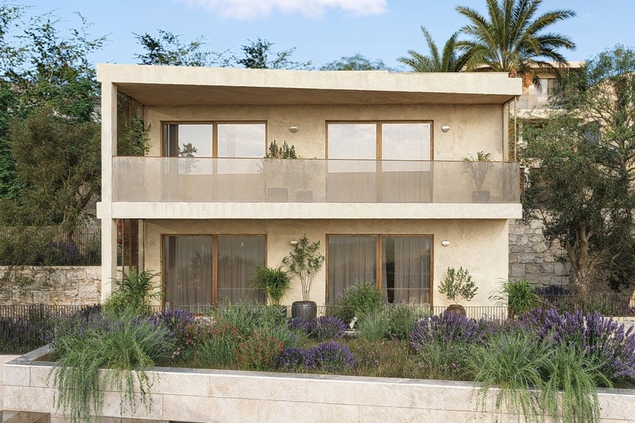 Facade with glass balustrade and garden