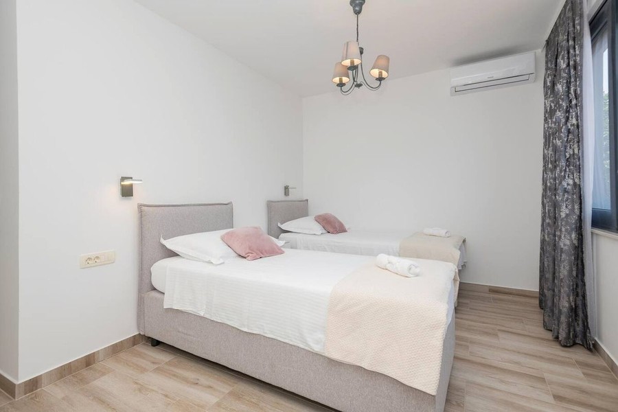 Bedroom with air conditioning unit