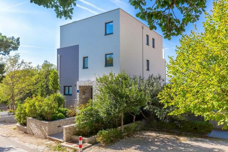 Modern villa on a slope with garden