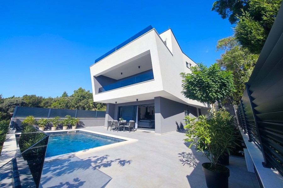 Modern villa with pool and sun terrace