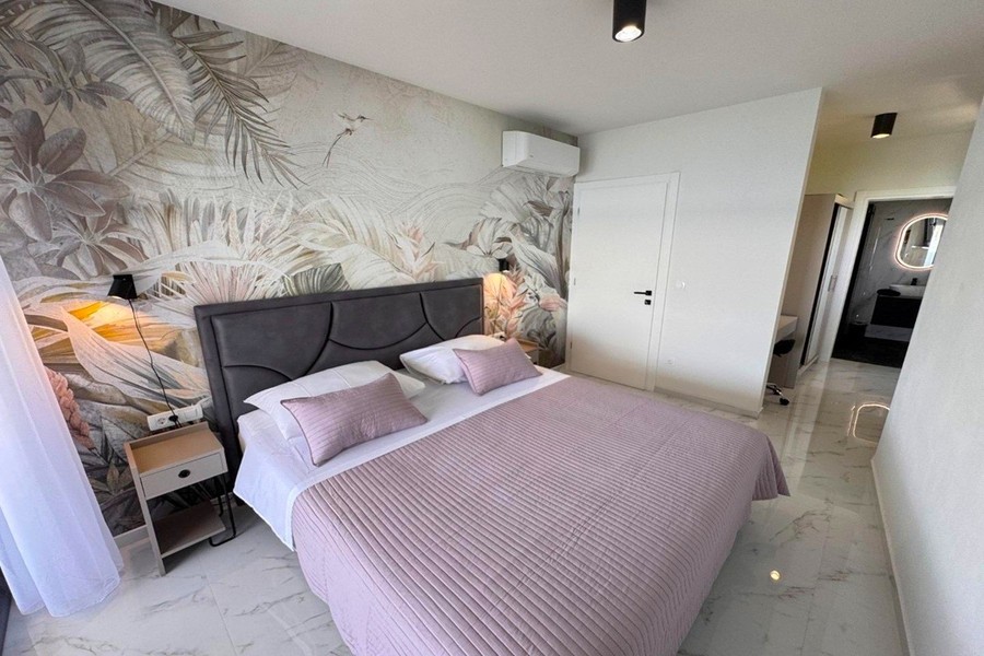 Bedroom with photo wallpaper
