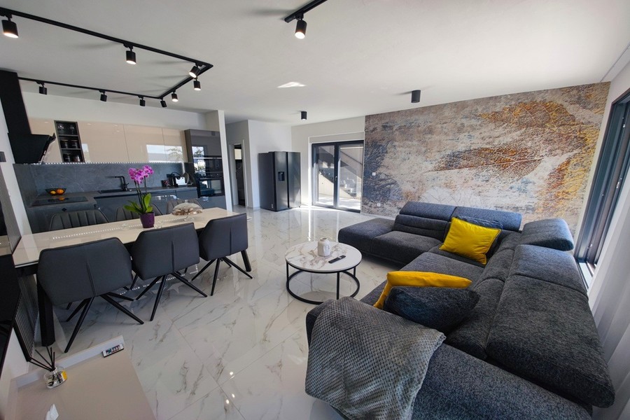 Open-plan living area with kitchen and dining area