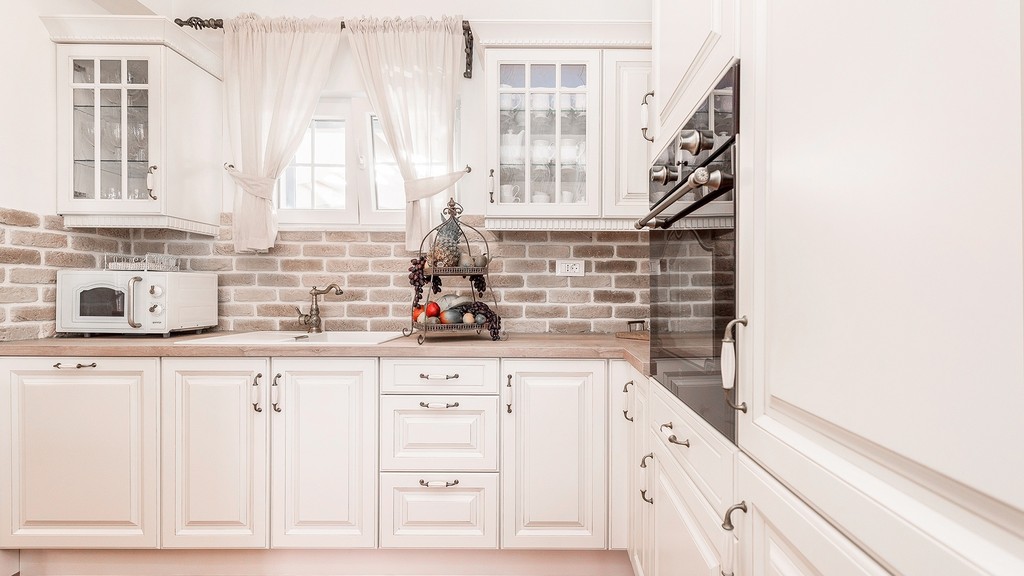 Kitchen with built-in appliances
