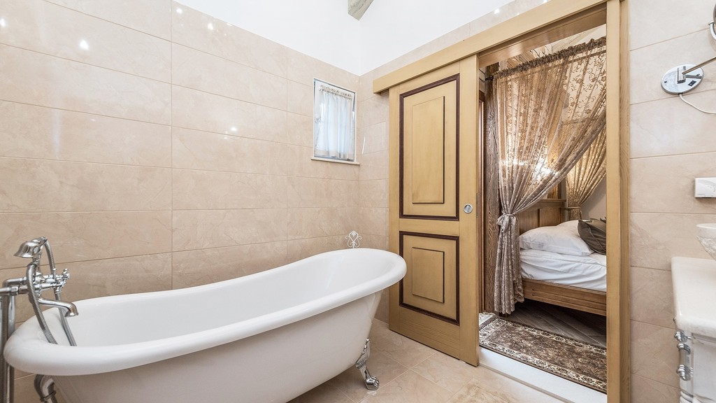 Bathroom with freestanding bath
