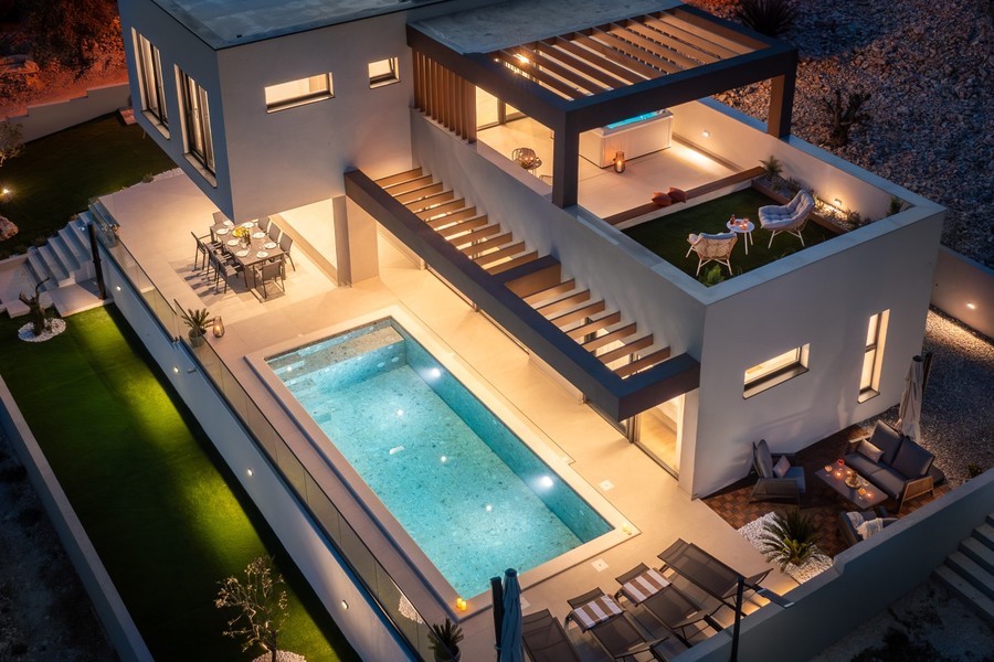 Villa and pool in the evening from above