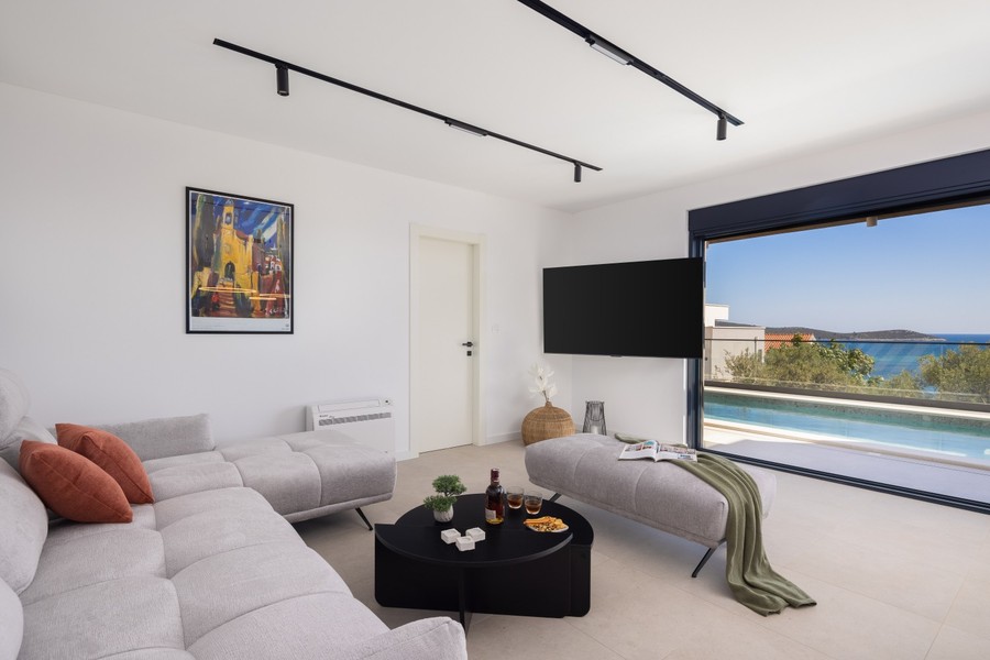 Living room with sofa and sea view