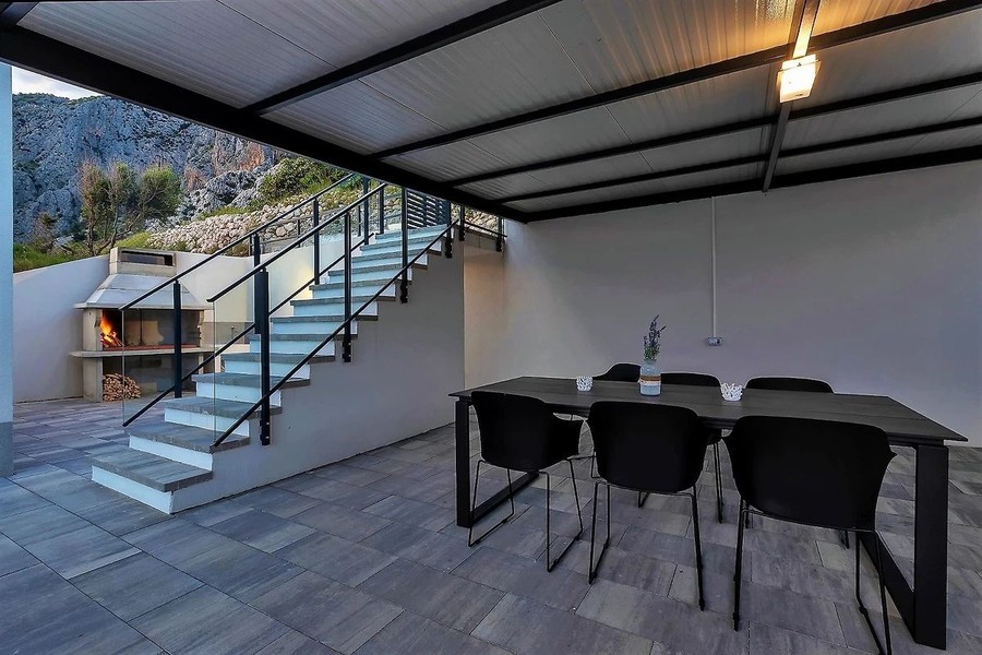 Covered dining area with barbecue
