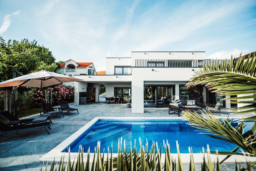 Villa with pool and palm trees