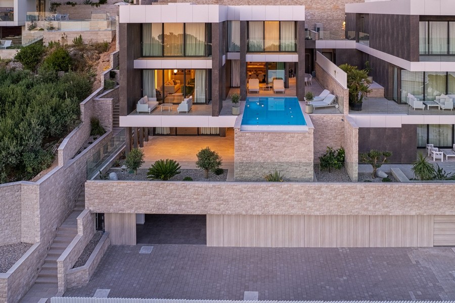 Villa with pool and garage, front view