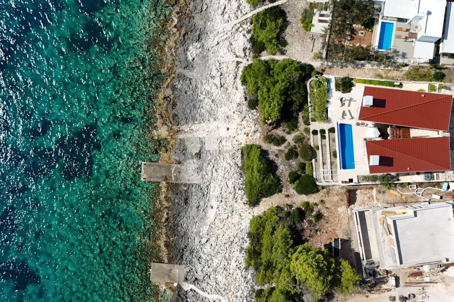 Aerial view of the coastline with the villa