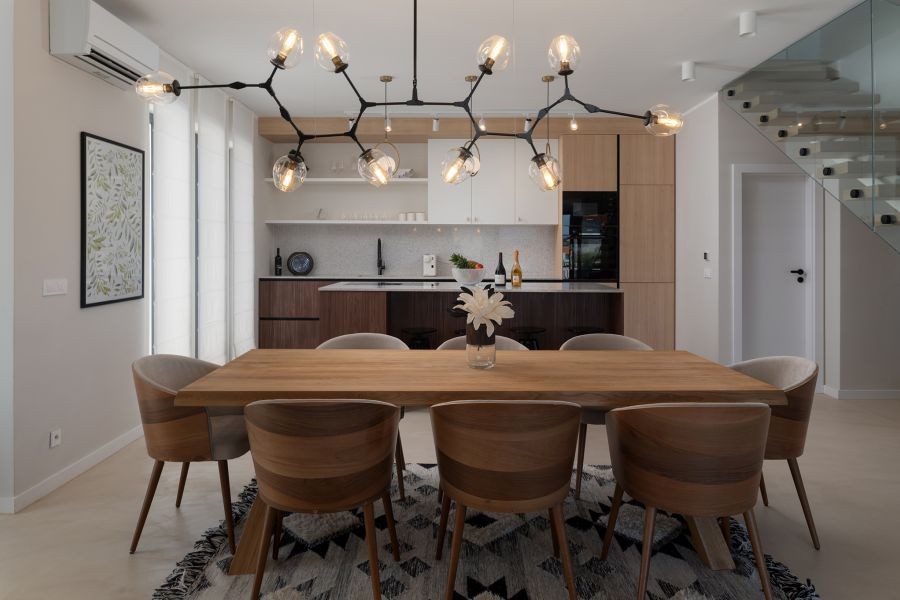 Dining table under a large pendant light