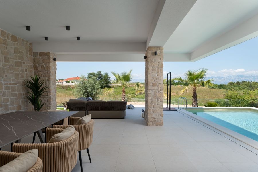 Covered lounge by the pool