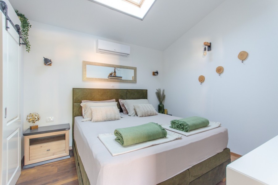 Bedroom with double bed and skylight