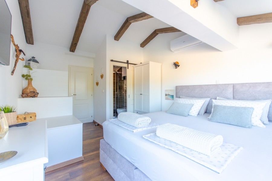 Bedroom with wooden beams