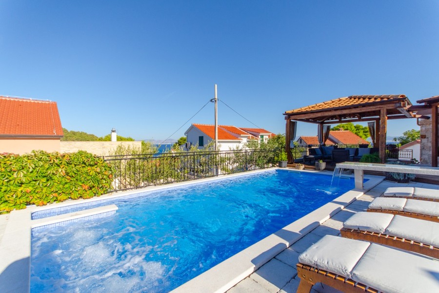Pool with stone waterfall