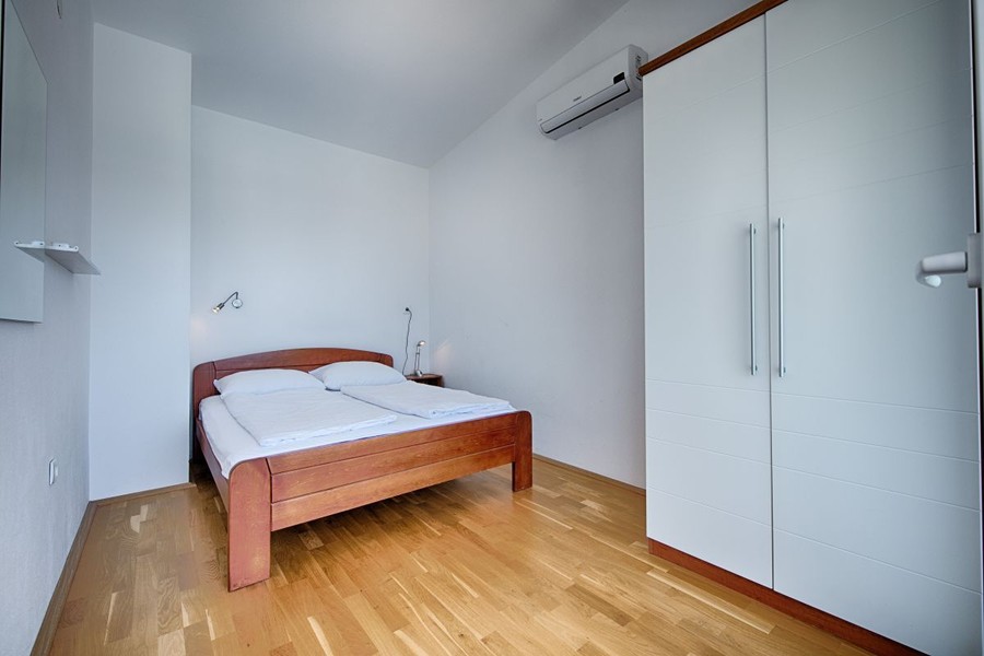 Bedroom with double bed and built-in wardrobe