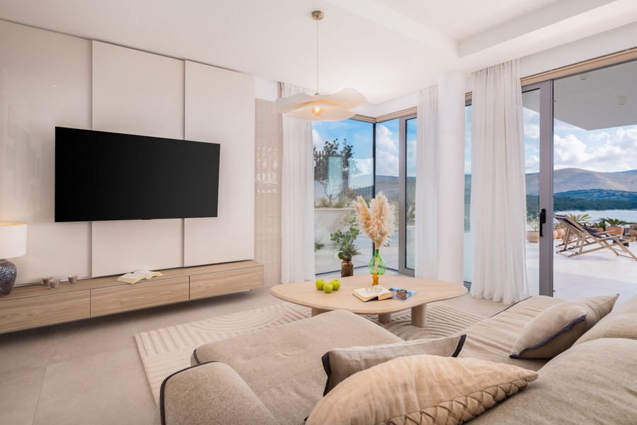 Living room with sofa and view of the sea